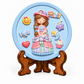 Girl character DIY POP craft with colourful raised designs on round blue base