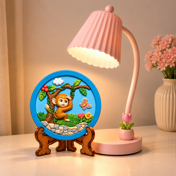 Round DIY monkey painting craft with cartoon monkey on a tree, colourful butterfly, flowers and green nature details.