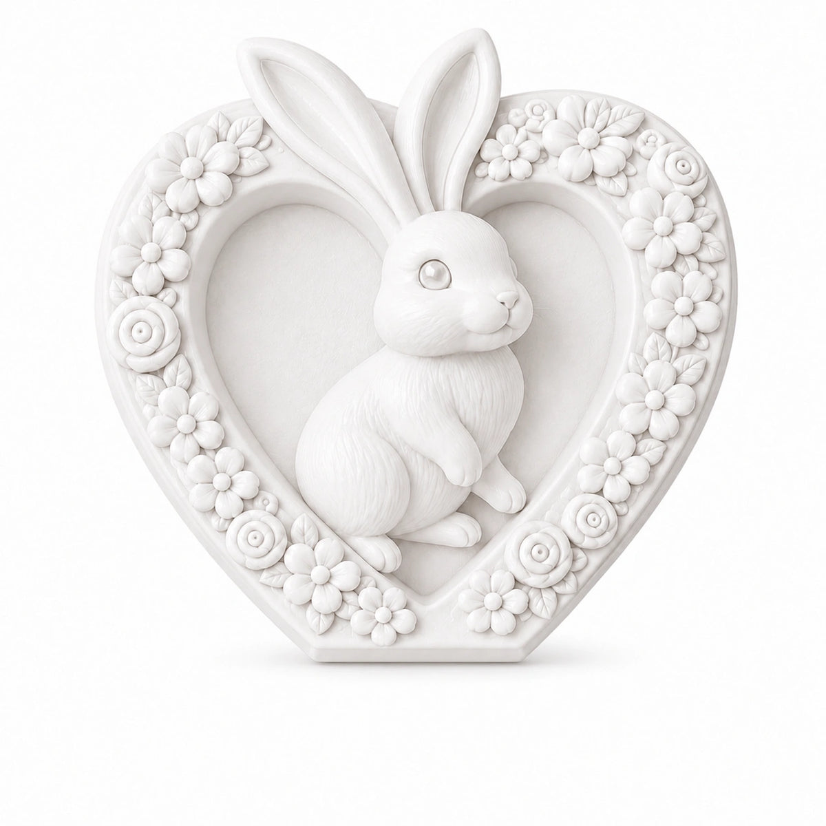 Unpainted white heart-shaped bunny craft with raised floral details