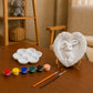 Bunny DIY painting kit with heart-shaped craft, paints, brushes and palette.