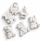 White unpainted DIY animal craft shapes featuring sheep, chicken, cat, pig, dog and cow for kids painting activity